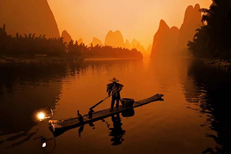 China Fischer bei Sonnenaufgang