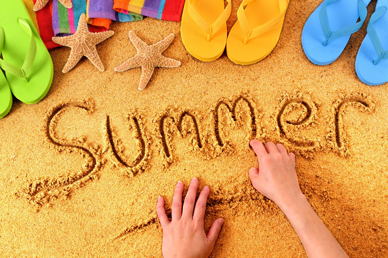Englischer Sommer Schriftzug im Sand