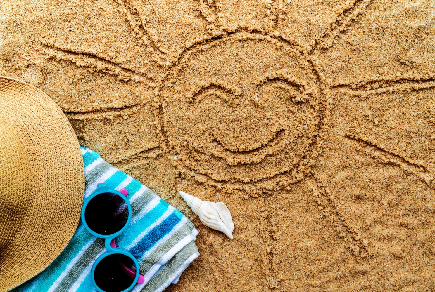 Sonne im Sand mit und im Sommer