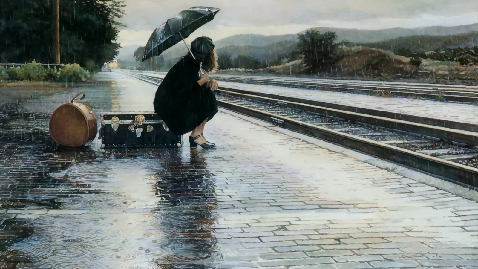 Frau mit Regenschirm am Bahnsteig